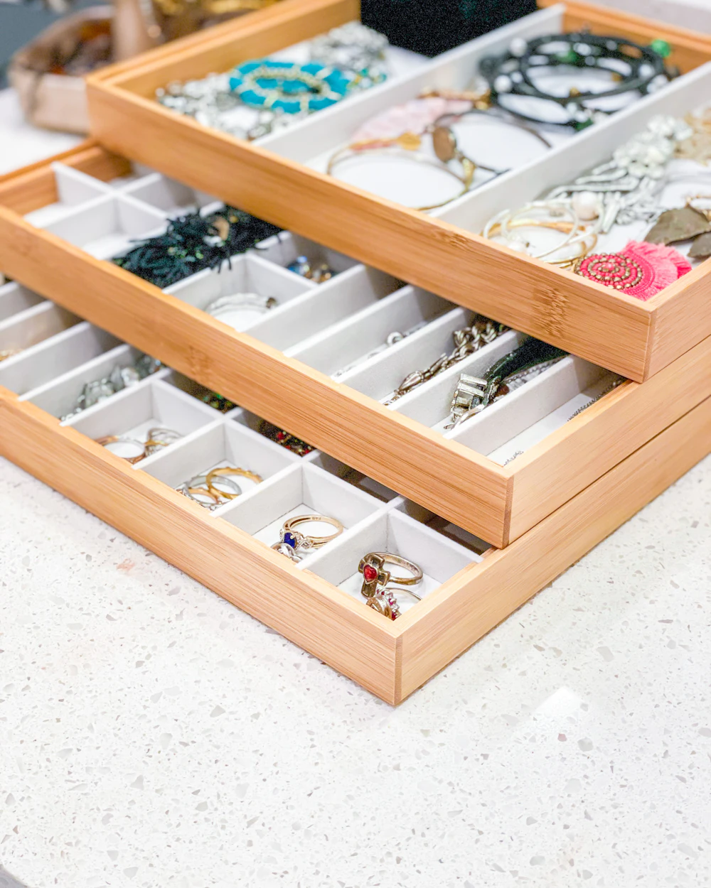 Stacked bamboo drawer trays with neat little compartments